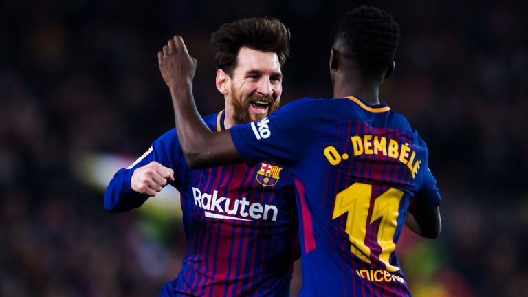 Lionel Messi of FC Barcelona celebrates with his teammate Ousmane Dembele after scoring his team's third goal during the La