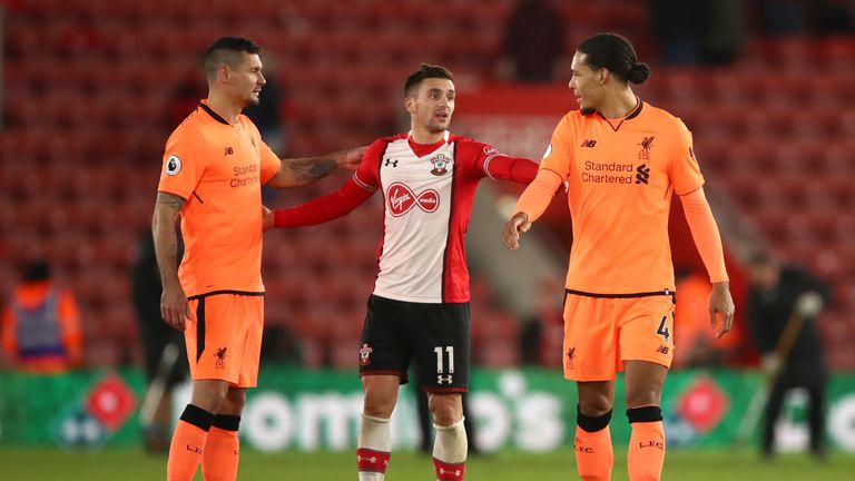 Liverpool's Virgil van Dijk (right), Dejan Lovren (left) and Southampton's Dusan Tadic after the final whistle during the Premier League match at St Mary's