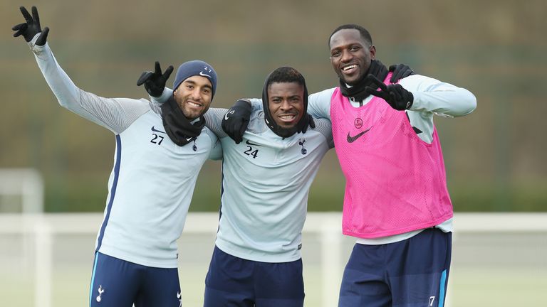 Lucas Moura, Serge Aurier and Moussa Sissoko stop to pose for a photograph during a training session at Tottenham Hotspur Training Centre