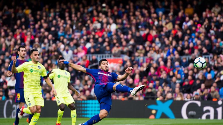 BARCELONA, SPAIN - FEBRUARY 11: Luis Suarez of FC Barcelona scores a disallowed goal during the La Liga match between Barcelona and Getafe at Camp Nou on F