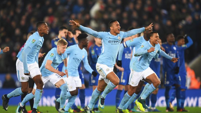 LEICESTER, ENGLAND - DECEMBER 19:  Danilo of Manchester City and team mates celebrate shoot out victory during the Carabao Cup Quarter-Final match between 