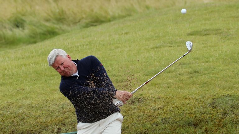 KINGSBARNS, SCOTLAND - AUGUST 01:  R&A Chief Executive Martin Slumbers hits froma bunker during a pro-am round prior to the Ricoh Women's British Open at K