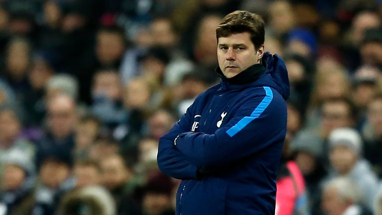 Tottenham Hotspur's Argentinian head coach Mauricio Pochettino watches from the touchline during the English FA Cup fourth round replay football match betw