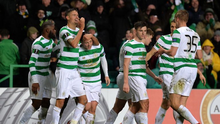 GLASGOW, SCOTLAND - FEBRUARY 15:  Callum McGregor of Celtic celebrates scoring the first Celtic goal with team mates during UEFA Europa League Round of 32 