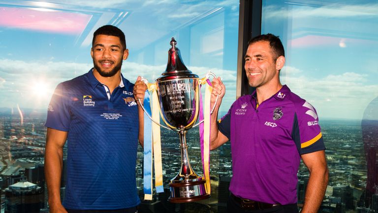 Kallum Watkins of Leeds Rhinos and Cameron Smith of Melbourne Storm holding the World Club Challenge Trophy