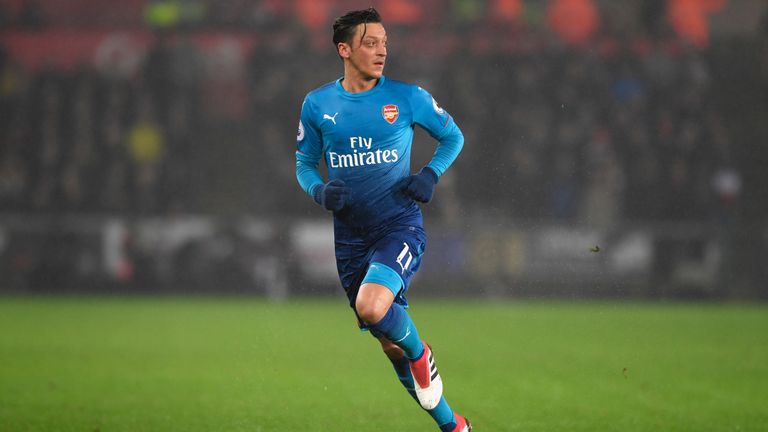 Arsenal player Mesut Ozil in action during the Premier League match between Swansea City and Arsenal at Liberty Stadium