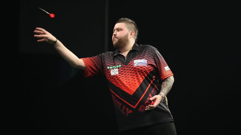 Michael Smith claimed the Qualifier Three title in Wigan. Picture credit: Lawrence Lustig