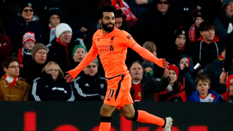 Liverpool's Egyptian midfielder Mohamed Salah celebrates scoring their second goal during the English Premier League football match between Southampton and