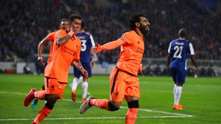 PORTO, PORTUGAL - FEBRUARY 14:  Mohamed Salah of Liverpool celebrates scoring the 2nd goal with Roberto Firmino of Liverpool during the UEFA Champions Leag
