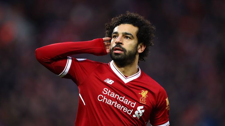 LIVERPOOL, ENGLAND - FEBRUARY 04:  Mohamed Salah of Liverpool celebrates after scoring his sides first goal during the Premier League match between Liverpo