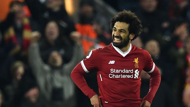 Liverpool's Egyptian midfielder Mohamed Salah celebrates scoring his team's second goal during the English Premier League football match between Liverpool 