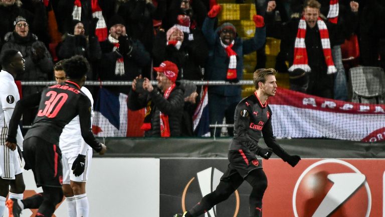 Nacho Monreal celebrates after opening the scoring