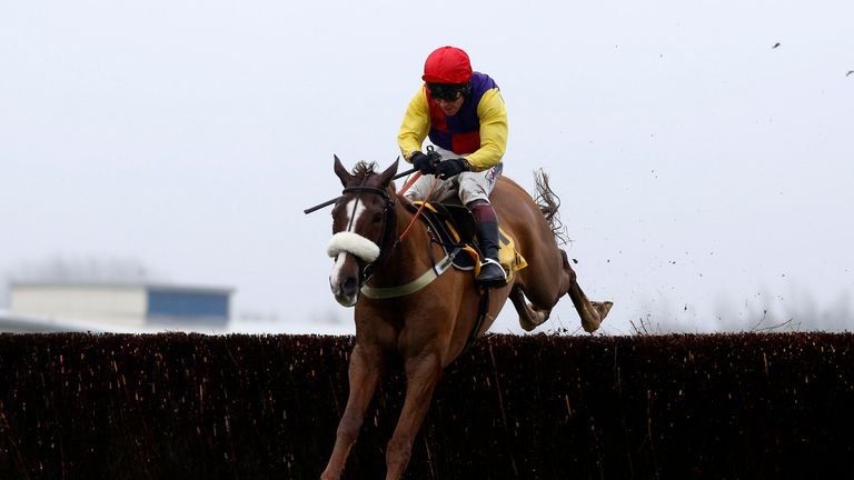 Native River ridden by Richard Johnson clear the last fence before going on to win The Betfair Denman Steeple Chase Race run during Betfair Super Saturday 