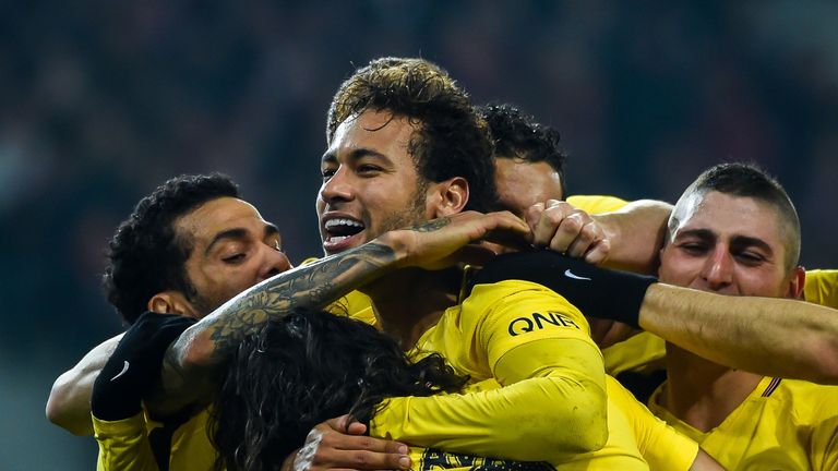 Paris Saint-Germain's Brazilian forward Neymar (C) celebrates with teammates after scoring a goal during French L1 football match between Lille Losc and Pa