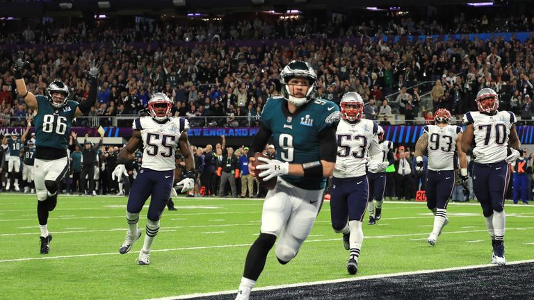 MINNEAPOLIS, MN - FEBRUARY 04:  Nick Foles #9 of the Philadelphia Eagles catches a 1-yard touchdown pass against the New England Patriots during the second