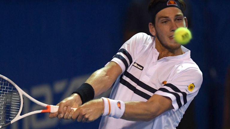 Britain's Cameron Norrie returns the ball to Austria's Dominic Thiem (out of frame) during their Mexico ATP 500 Open men's single tennis match in Acapulco,