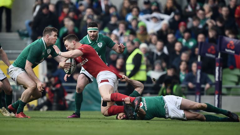 DUBLIN, IRELAND - FEBRUARY 24: Rob Kearney of Ireland tackles George North of Wales during the Six Nations Championship rugby match between Ireland and Wal