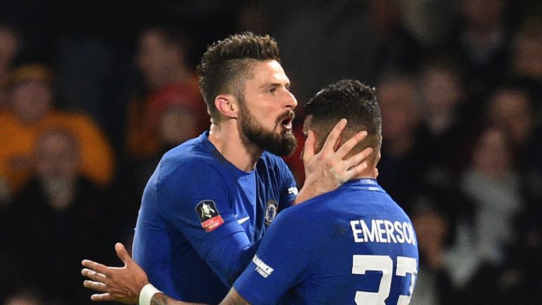 Chelsea's French attacker Olivier Giroud (L) celebrates with Chelsea's Brazilian defender Emerson Palmieri scoring the team's fourth goal during the Englis