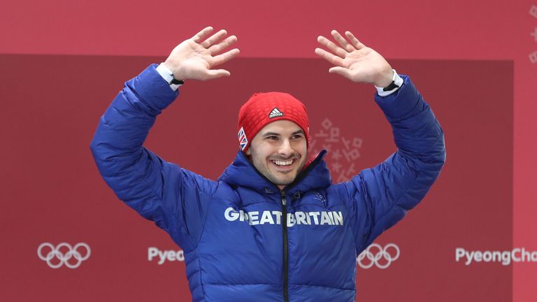 Team GB's Dom Parsons celebrates getting a bronze medal in the Skeleton