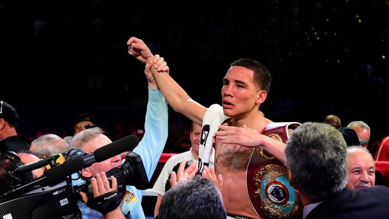 Oscar Valdez of Mexico celebrates his unanimous 12 round decision over Miguel Marriaga of Colombia during the WBO Featherweight title fight