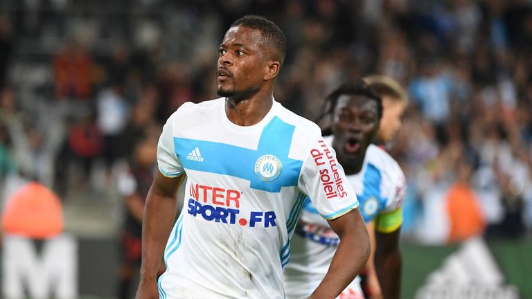 Olympique de Marseille French defender Patrice Evra celebrates after scoring the second goal during the French L1 football match between Olympique of Marse