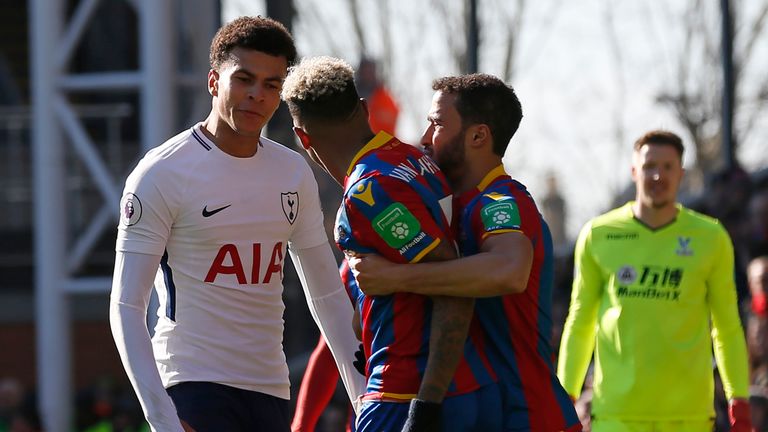 Dele Alli (L) clashes with Crystal Palace defender Patrick van Aanholt 