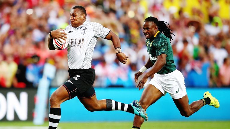   Paula Dranisinukula of Fiji makes a break against South Africa