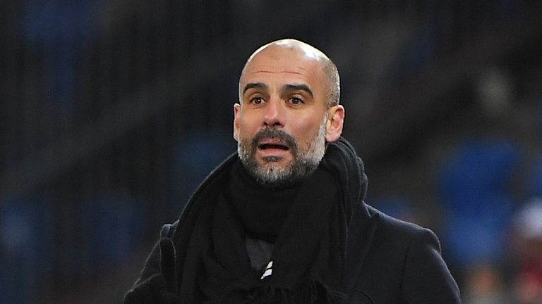 Manchester City's Spanish head coach Pep Guardiola reacts  during the UEFA Champions League round of 16 first leg football match between Basel and Manchest