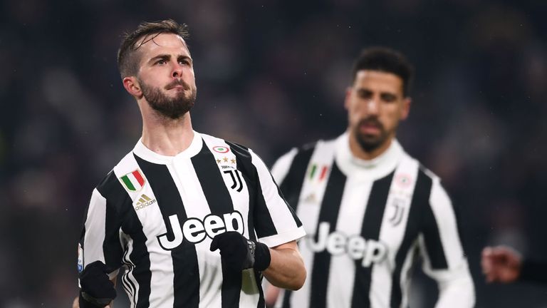 Juventus' midfielder Miralem Pjanic of Bosnia (L) celebrates after scoring during the Italian Tim Cup football match between Juventus and Atalanta