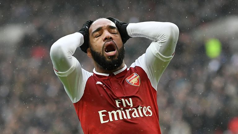 Alexandre Lacazette reacts following a missed chance during the Premier League match between Tottenham Hotspur and Arsenal