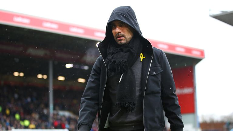 BURNLEY, ENGLAND - FEBRUARY 03:  Josep Guardiola, Manager of Manchester City takes a look around the stadium prior to the Premier League match between Burn
