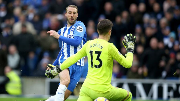 Glenn Murray slides the ball under Adrian to make it 1-0