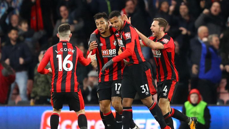Joshua King of AFC Bournemouth celebrates scoring his side's first goal with team-mates