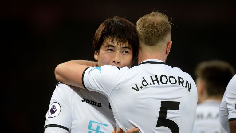 Ki Sung-Yueng celebrates his goal for Swansea with Mike van der Hoorn