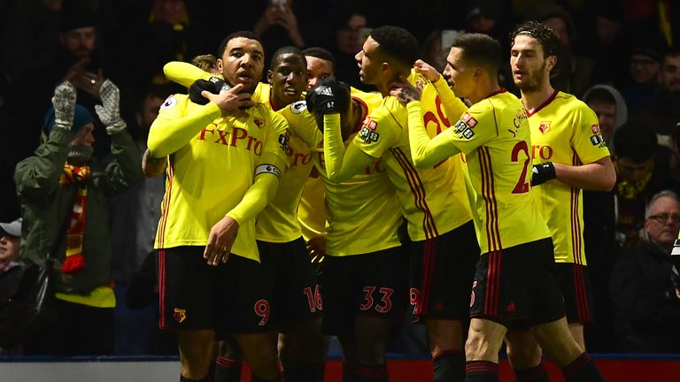 Watford's Troy Deeney celebrates scoring his side's first goal with teammates