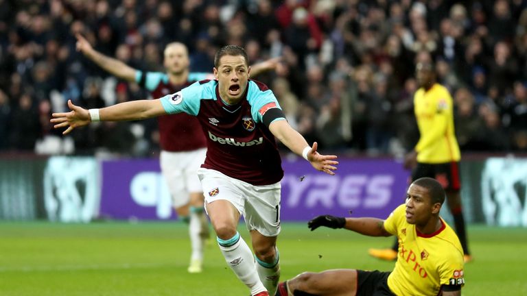 Javier Hernandez celebrates after scoring the opening goal of the game