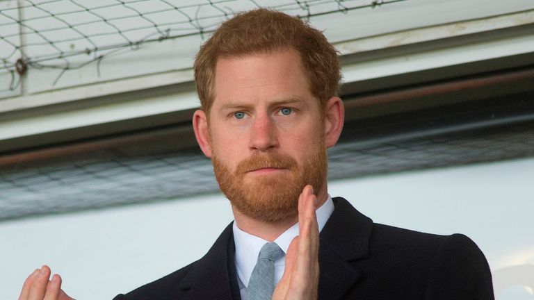 Prince Harry applauds as he watches the Women's Six Nations international rugby union match between England Women and Wales Women at The Stoop in
