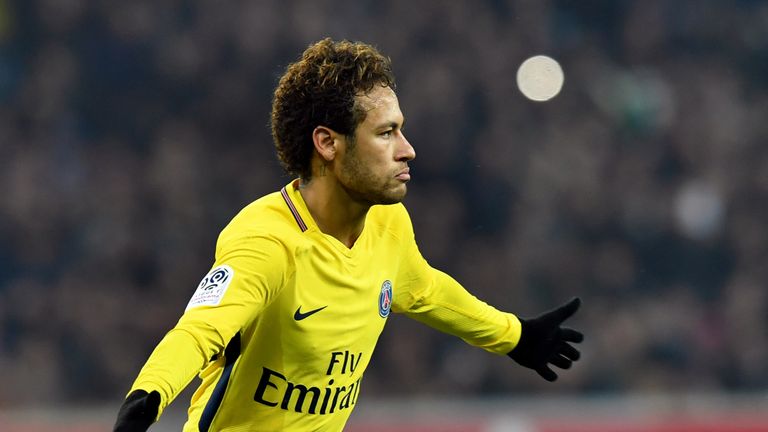 Paris Saint-Germain's Brazilian forward Neymar celebrates after scoring a goal during French L1 football match at Lille
