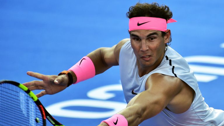Spain's Rafael Nadal returns the ball during an exibition match the day before the start of the Mexico ATP 500 Tennis Open in Acapulco, Guerrero state, Mex