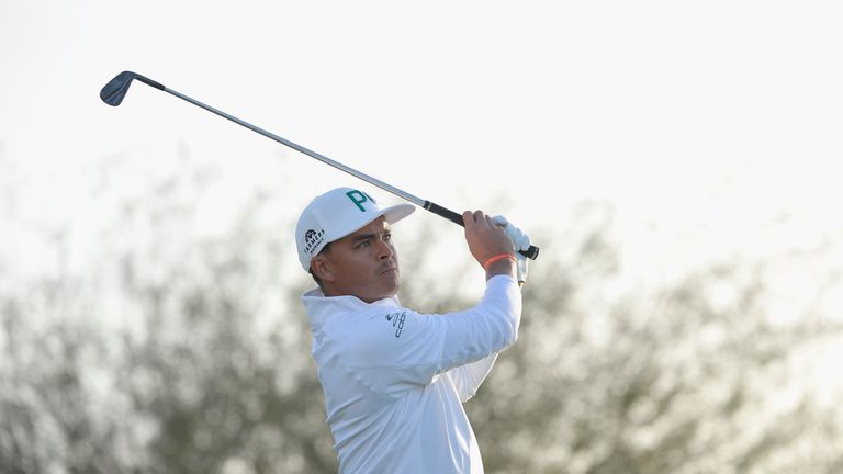 SCOTTSDALE, AZ - FEBRUARY 01:  Rickie Fowler watches his tee shot on the 12th hole during the first round of the Waste Management Phoenix Open at TPC Scott