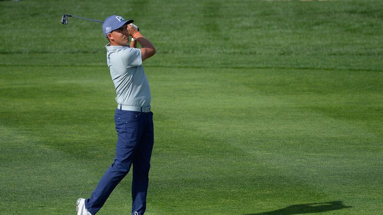 SCOTTSDALE, AZ - FEBRUARY 02:  Rickie Fowler watches his second shot on the ninth hole during the second round of the Waste Management Phoenix Open at TPC 