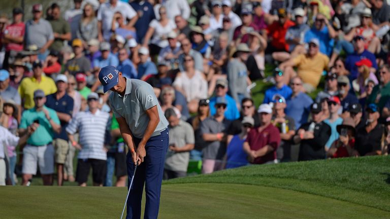 SCOTTSDALE, AZ - FEBRUARY 02:  Rickie Fowler watches a putt on the ninth hole during the second round of the Waste Management Phoenix Open at TPC Scottsdal