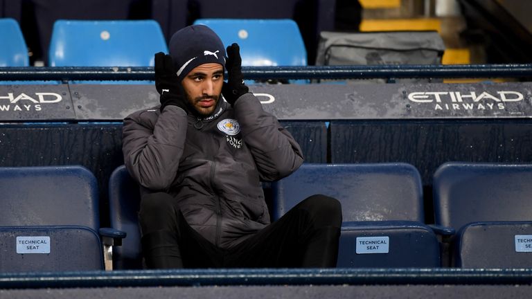 MANCHESTER, ENGLAND - FEBRUARY 10:  Riyad Mahrez of Leicester City looks on from the bench prior to the Premier League match between Manchester City and Le