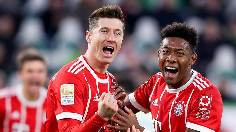 Robert Lewandowski and David Alaba celebrate the late winner