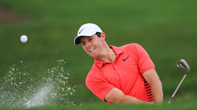 PALM BEACH GARDENS, FL - FEBRUARY 22:  Rory McIlroy of Northern Ireland plays a shot out of a bunker on the third hole during the first round of the Honda 