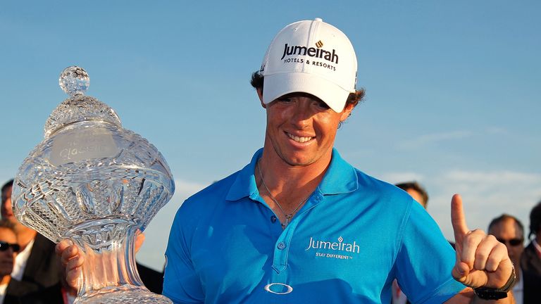 PALM BEACH GARDENS, FL - MARCH 04:  Rory McIlroy of Northern Ireland poses with the trophy after winning the Honda Classic at PGA National on March 4, 2012