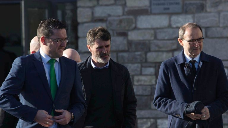 Roy Keane and Martin O'Neill  arrive for the funeral of former Celtic and Manchester United footballer Liam Miller, at St. John the Baptist Church