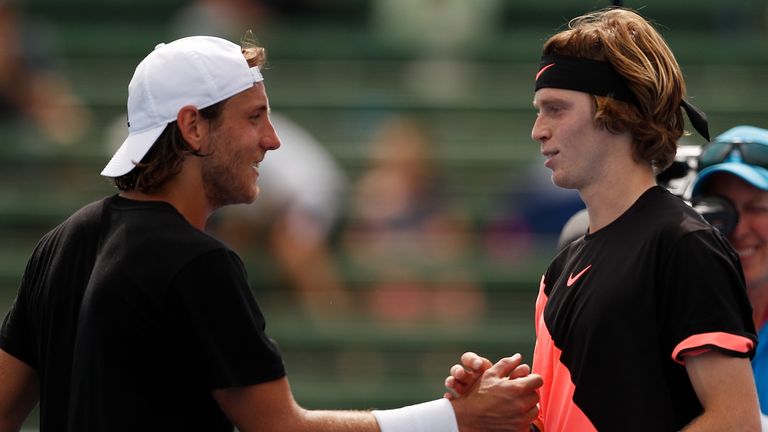 MELBOURNE, AUSTRALIA - JANUARY 11:  Lucas Pouille of France (L) congratulates Andrey Rublev of Russia (R) after being defeated by him during day three of t