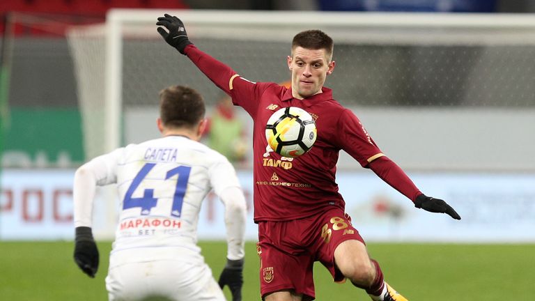 KAZAN, RUSSIA - OCTOBER 21: Ruslan Kambolov (R) FC Rubin Kazan vies for the ball  with Aleksandr Sapeta FC Dinamo Moscow during the Russian Premier League 