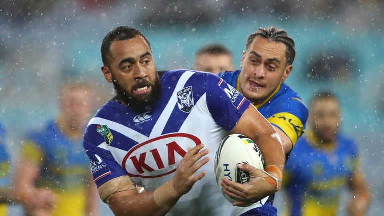 SYDNEY, AUSTRALIA - AUGUST 03:  Sam Kasiano of the Bulldogs is tackled during the round 22 NRL match between the Canterbury Bulldogs and the Parramatta Eel
